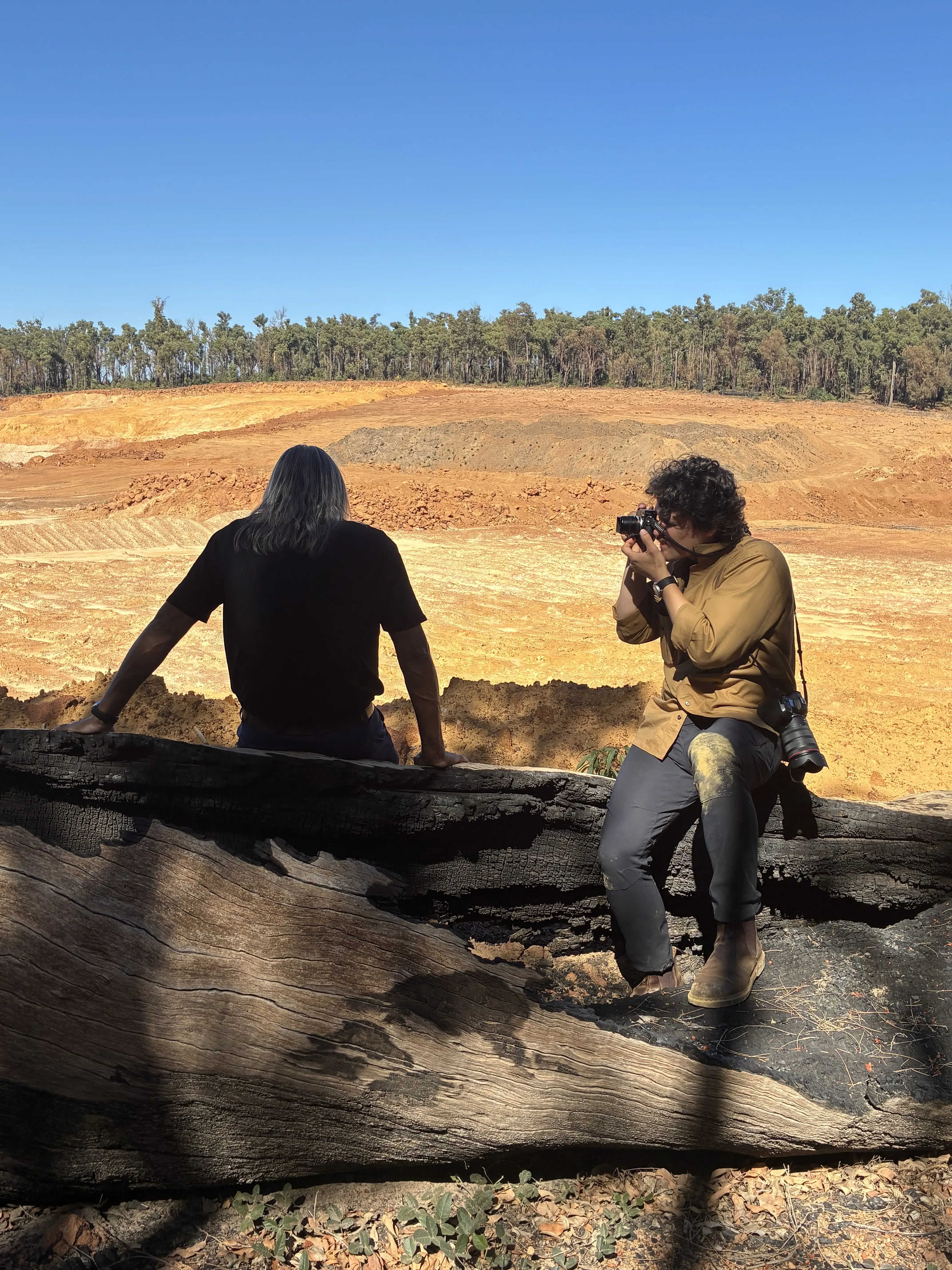 PublicSource photojournalist Quinn Glabicki photographs George Walley, a Noongar elder, at an Alcoa mine site in Western Australia. Image by Jamie Wiggan/PublicSource.